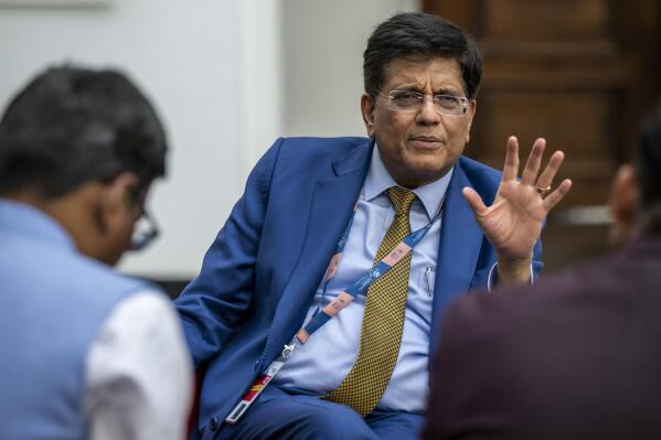 Piyush Goyal, Minister of Commerce and Industry and Minister of Consumer Affairs of India, speaks in front of journalists before the closing of the 12th Ministerial Conference (MC12), at the headquarters of the World Trade Organization (WTO), in Geneva, Switzerland, Thursday, June 16, 2022. Talks are going down to the wire as the World Trade Organization is set to wrap up its first ministerial-level meeting in more than four years.(Martial Trezzini/Keystone via AP)