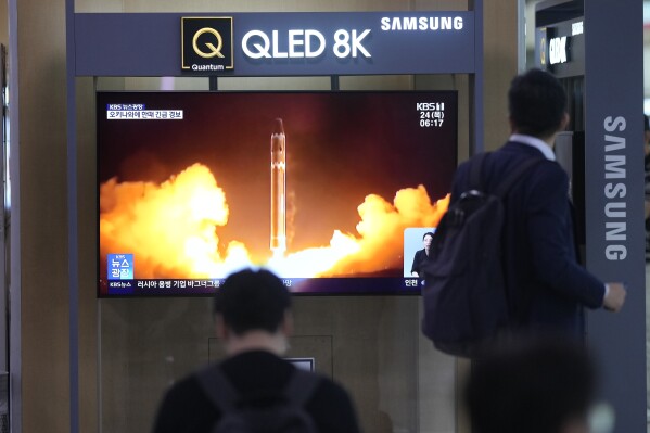 A TV screen shows a report of North Korea's rocket launch with file image during a news program at the Seoul Railway Station in Seoul, South Korea, Thursday, Aug. 24, 2023. North Korea said Thursday that its second attempt to launch a spy satellite failed but vowed to make a third attempt in October. (AP Photo/Lee Jin-man)