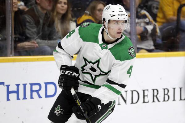 FILE - In this Saturday, Dec. 14, 2019, file photo, Dallas Stars defenseman Miro Heiskanen, of Finland, plays against the Nashville Predators in the second period of an NHL hockey game, in Nashville, Tenn. The Dallas Stars have signed defenseman Heiskanen to an eight-year contract worth $67.6 million. The deal announced Saturday, July 17, 2021, carries an annual salary cap hit of $8.45 million through the 2028-29 season. (AP Photo/Mark Humphrey, File)