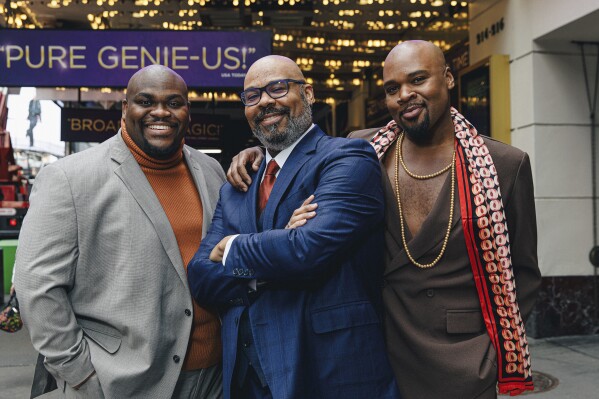 This undated image released by Disney Theatricals shows actors Marcus M. Martin, from left, James Monroe Iglehart, and Michael James Scott in New York. Martin, Iglehart, and Scott have portrayed Genie in the Disney musical. (Marc. J. Franklin/Disney Theatricals via AP)