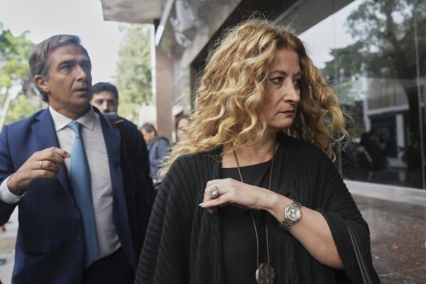 Psychiatrist Nancy Forlini arrives for a court hearing in the trial charging the medical team that treated late soccer star Diego Maradona with alleged homicide by negligence in San Isidro, on the outskirts of Buenos Aires, Argentina, Tuesday, March 11, 2025. (AP Photo/Natacha Pisarenko)