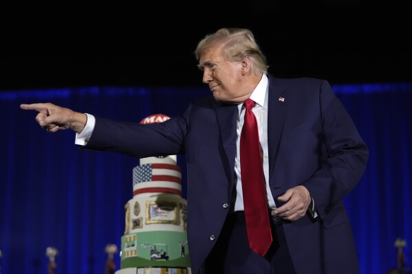 Republican presidential candidate former President Donald Trump gestures after speaking at his birthday celebration, hosted by Club 47, in West Palm Beach, Fla., Friday, June 14, 2024. (AP Photo/Gerald Herbert)