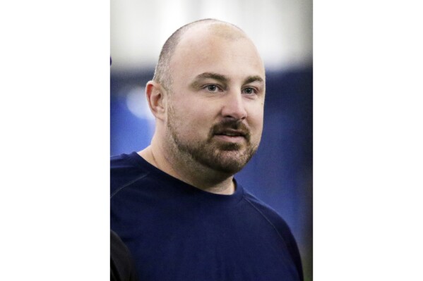 Michigan linebackers coach Chris Partridge attends the Youth Pro Level Football Camp in Waldwick, N.J., Saturday, April 9, 2016. Michigan fired linebackers coach Chris Partridge, Friday, Nov. 17, 2023, a day after the school reached an agreement with the Big Ten to have head coach Jim Harbaugh serve the remainder of a three-game suspension in return for the conference ending its investigation into a scheme to steal opponents' play-calling signals. (Chris Pedota/The Record via AP, File)