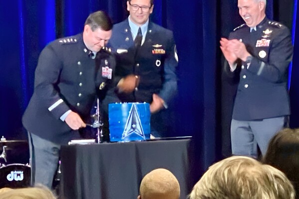 USSF leaders cut birthday cake at recent SFA Spacepower Conference in Orlando, FL