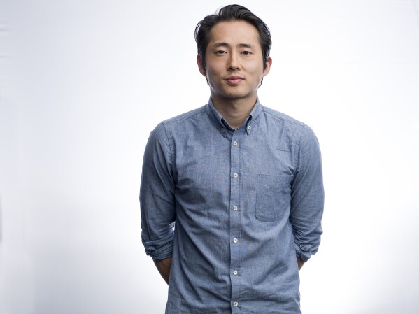 FILE - Actor Steve Yeun poses on Oct. 10, 2013, in New York. The Asian American Foundation will hold a Heritage Month Summit in May 2024 in New York City for AAPI Heritage Month. Emmy-winning actor Yeun, Boston Mayor Michelle Wu and actor Maulik Pancholy — who had an upcoming appearance canceled by a Pennsylvania school board over his sexual orientation — are among those set to attend. (Photo by Scott Gries/Invision/AP, File)