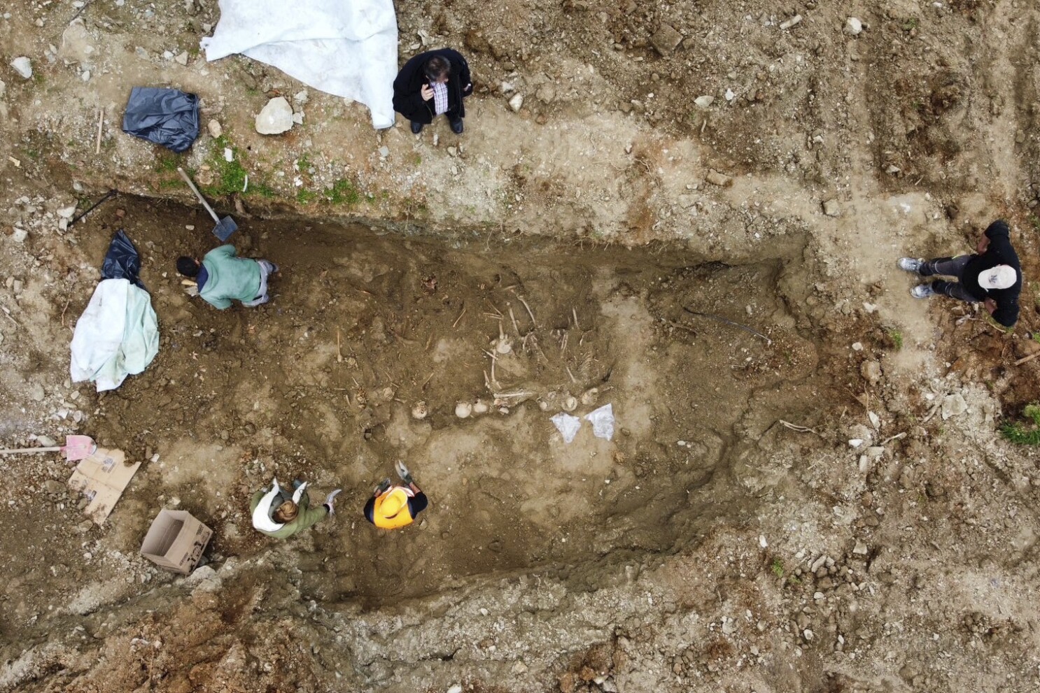 Discovered by chance, a mass grave revives memories of Greece's brutal civil war