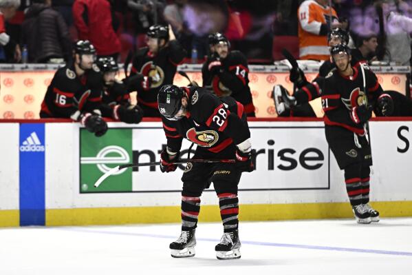 Ottawa Senators right wing Claude Giroux (28) skates with his head down after the team's loss to the Philadelphia Flyers after an NHL hockey game, Saturday, Nov. 5, 2022 in Ottawa, Ontario. (Justin Tang/The Canadian Press via AP)