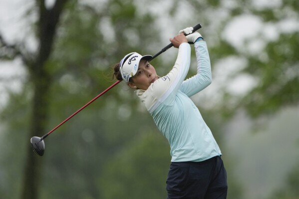 Atthaya Thitikul, of Thailand, hits off the 13th tee during the first round of the Mizuho Americas Open golf tournament, Thursday, May 16, 2024, in Jersey City, N.J. (AP Photo/Seth Wenig)