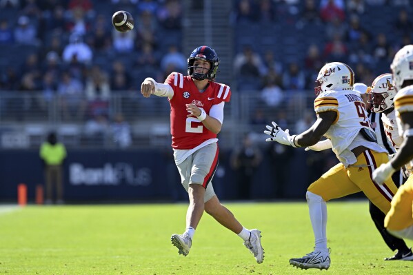 Mississippi quarterback Jaxson Dart (2) releases a pass during the first half of an NCAA college football game against Louisiana Monroe in Oxford, Miss., Saturday, Nov. 18, 2023. (AP Photo/Thomas Graning)