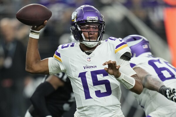 FILE - Minnesota Vikings quarterback Joshua Dobbs (15) plays against the Las Vegas Raiders during an NFL football game Dec. 10, 2023, in Las Vegas. The San Francisco 49ers have agreed to a deal with Dobbs to give the team another option at backup behind Brock Purdy. (AP Photo/John Locher, File)