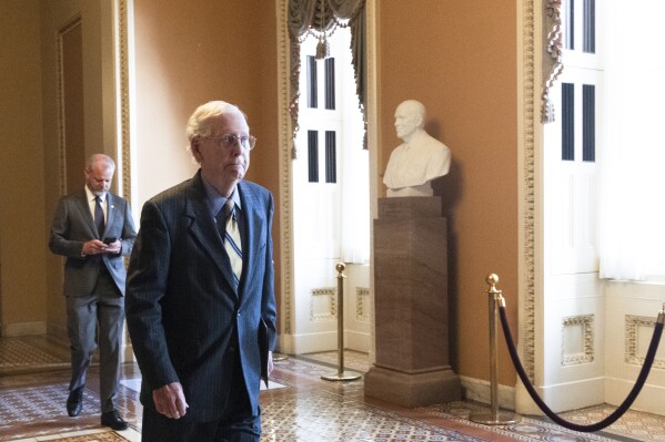Senate Minority Leader Mitch McConnell, R-Ky., walks towards the Senate floor on Capitol Hill, Wednesday, Feb. 7, 2024, in Washington. (APPhoto/Manuel Balce Ceneta)