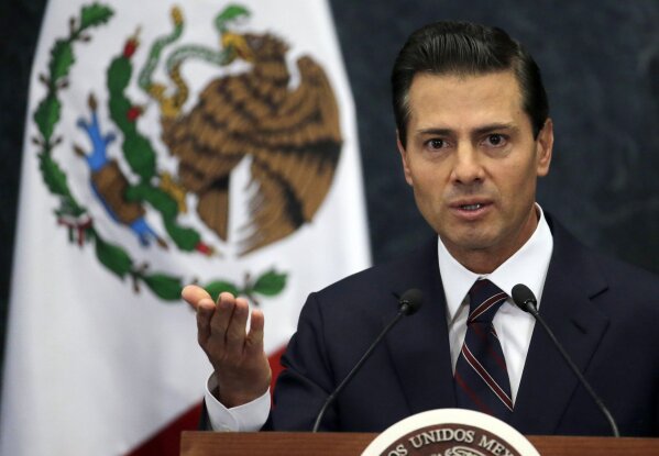 FILE - In this Wednesday, Jan. 4, 2017, file photo, then-Mexico's President Enrique Pena Nieto speaks during a news conference at the Los Pinos presidential residence in Mexico City. In some of the most explosive accusations in recent Mexican political history, the former head of the state-owned oil company, directly accused former President Enrique Peña Nieto and his treasury secretary of directing a scheme of kickbacks and embezzlement directly from the president’s office. (AP Photo/Marco Ugarte, File)