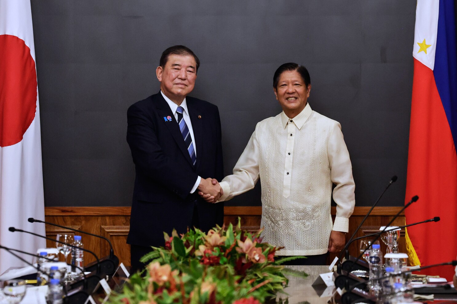 Japan and Philippines to start talks on 2 defense pacts in the face of China's growing aggression