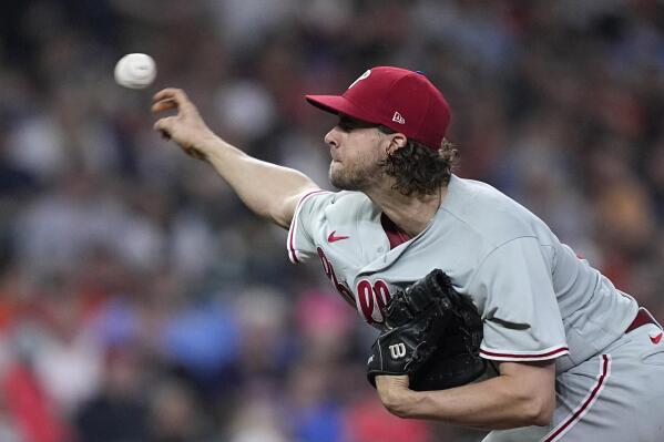 Philadelphia Phillies starting pitcher Aaron Nola throws during the eighth inning of a baseball game against the Houston Astros Friday, April 28, 2023, in Houston. (AP Photo/David J. Phillip)
