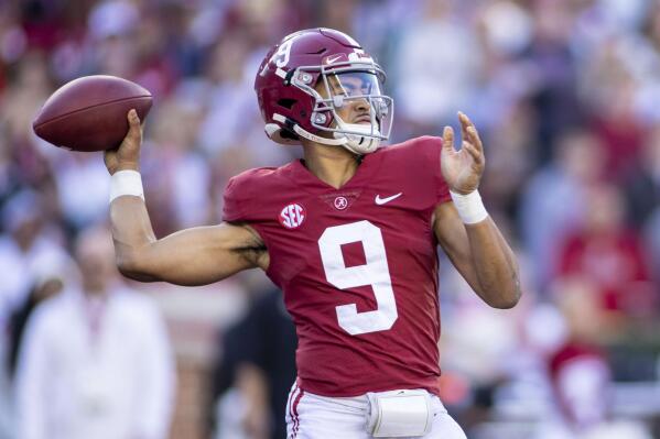Alabama quarterback Bryce Young (9) throws against Arkansas during the first half of an NCAA college football game, Saturday, Nov. 20, 2021, in Tuscaloosa, Ala. (AP Photo/Vasha Hunt)