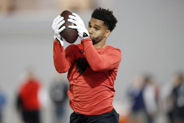 Wide receiver Chris Olave runs a football drill during Ohio State Pro Day in Columbus, Ohio, Wednesday, March 23, 2022. (AP Photo/Paul Vernon)