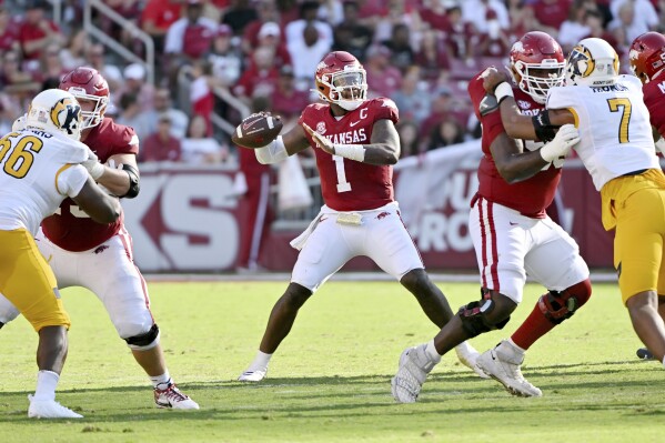 Arkansas quarterback KJ Jefferson (1) reaches back to pass against Kent State during the second half of an NCAA college football game Saturday, Sept. 9, 2023, in Fayetteville, Ark. (AP Photo/Michael Woods)