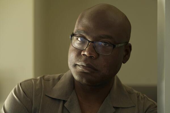Terrence Hersey stands for a portrait at his home Friday, June 17, 2022, in South Holland, Ill. Hersey underwent extensive rehabilitation for a stroke in 2015, before his doctors eventually cleared him to return to work in 2016. But Union Pacific decided without ever having a doctor examine him that the stroke made him unfit to work for the railroad. Union Pacific has already lost three lawsuits over the way it dismisses employees with health conditions because of safety concerns, and the prospect of hundreds more similar lawsuits, including Hersey's case, looms over the railroad. (AP Photo/Charles Rex Arbogast)