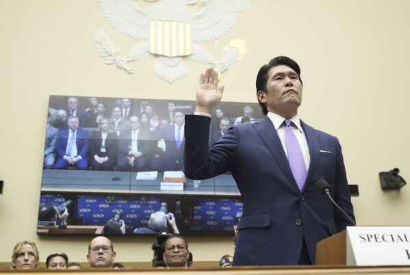 Department of Justice Special Counsel Robert Hur is sworn in before a House Judiciary Committee hearing, Tuesday March 12, 2024, on Capitol Hill in Washington. (AP Photo/Jacquelyn Martin)
