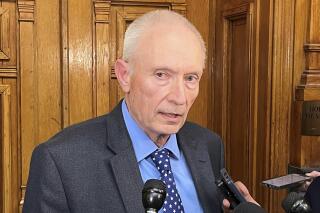 Indiana House Ways and Means Committee Chairman Jeff Thompson, R-Lizton, speaks with reporters about the state budget proposal at the Indiana Statehouse in Indianapolis, Friday, Feb. 17, 2023. The House Republican budget plan includes speeding up planned cuts to the state's personal income tax rates and further expanding the private school voucher program. (AP Photo/Tom Davies)