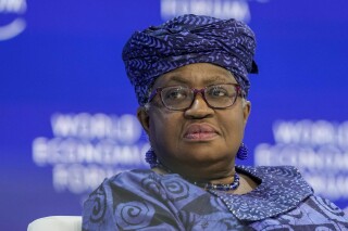 FILE - Ngozi Okonjo-Iweala, Director-General of the World Trade Organization takes part in a panel at the Annual Meeting of World Economic Forum in Davos, Switzerland, Wednesday, Jan. 17, 2024. The head of the World Trade Organization insisted it remains relevant and is focused on reform “no matter who comes into power, when,” as Donald Trump — who as U.S. president bypassed its rules by slapping tariffs on America’s friends and foes alike — makes another run at the White House. (AP Photo/Markus Schreiber, File)