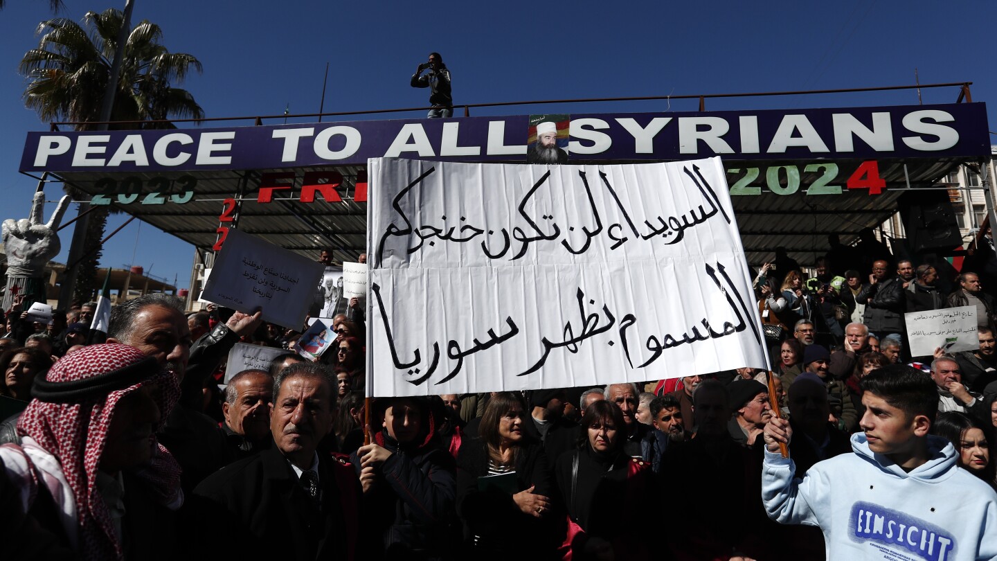 Israel's military is told to prepare to defend a Druze community outside Syria's capital