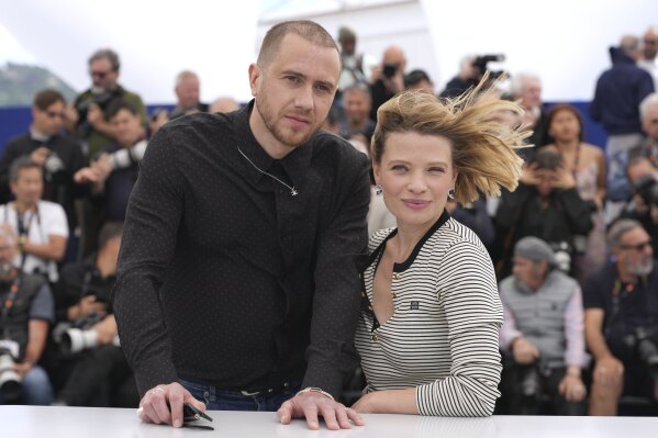 Bastien Bouillon, Links and Melanie Laurent Pose for photographers at the photo Call for the Film 'Connemara' at the 78th International Film Festival, Cannes, southern France, Thursday, May 22, 2025.