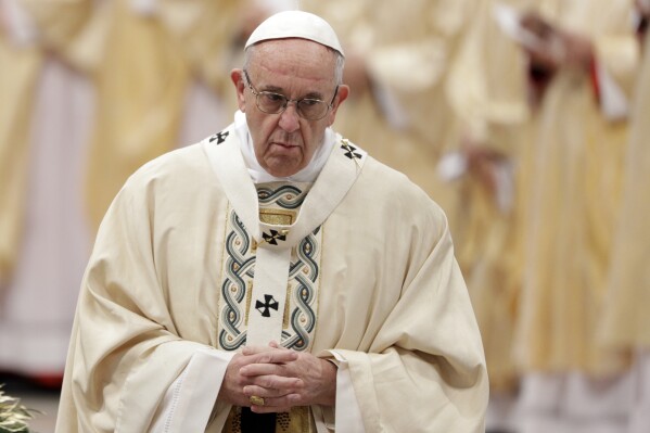 Pope Francis arrives to celebrate an Epiphany Mass in St. Peter's Basilica at the Vatican, Jan. 6, 2018. (AP Photo/Andrew Medichini, File)