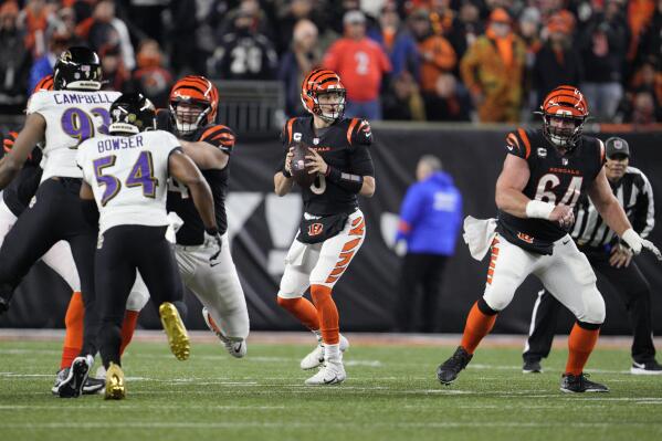 Cincinnati Bengals quarterback Joe Burrow drops back to pass in the first half of an NFL wild-card playoff football game against the Baltimore Ravens in Cincinnati, Sunday, Jan. 15, 2023. (AP Photo/Jeff Dean)