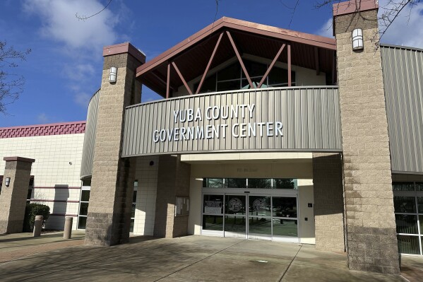 A sign marks the Yuba County Registrar of Voters office in Marysville, Calif. on Wednesday, Jan. 17, 2024. Authorities are investigating a suspicious envelope sent to the elections office in Yuba County on Wednesday morning that might have contained fentanyl. (AP Photo/Adam Beam)