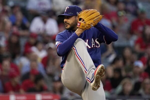 Texas Rangers starting pitcher Martin Perez throws to the plate during the fourth inning of a baseball game against the Los Angeles Angels Friday, July 29, 2022, in Anaheim, Calif. (AP Photo/Mark J. Terrill)
