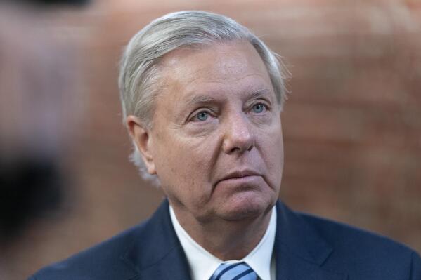 FILE - Sen. Lindsey Graham, R-S.C., speaks with reporters on Capitol Hill in Washington, March 16, 2022. Graham on Friday, Oct. 21, asked the U.S. Supreme Court to intervene after a lower court ordered him to testify before a special grand jury in Georgia investigating whether then-President Donald Trump and others illegally tried to influence the 2020 election in the state. (AP Photo/Alex Brandon, File)