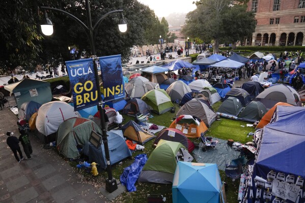 Tents are placed on an encampment on the UCLA campus, the morning after clashes between pro-Israel and pro-Palestinian groups, Wednesday, May 1, 2024, in Los Angeles. (AP Photo/Jae C. Hong)