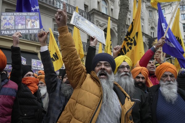 FILE - Sikh protesters demonstrate outside of the Indian High Commission in London on March 22, 2023. India has been asking countries like Canada, Australia and the U.K. to take legal action against Sikh activists, and Modi has personally raised the issue with the nations' prime ministers. (AP Photo/Kin Cheung, File)