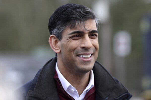 Britain's Prime Minister Rishi Sunak arrives at a bus depot for the launch of the local elections campaign in Heanor, England, Friday, March 22, 2024. (AP Photo/Darren Staples, Pool)