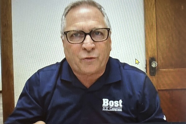 U.S. Rep. Mike Bost discusses his re-election campaign via video conference in this Monday, March 4, 2024 photo. The five-term incumbent is facing a March 19th primary challenge from Darren Bailey, a former state senator and 2022 nominee for Illinois governor. Bost has the endorsement of former President Donald Trump for the race in the 12th District, which encompasses the bottom one-third of Illinois. (AP Photo/John O'Connor)