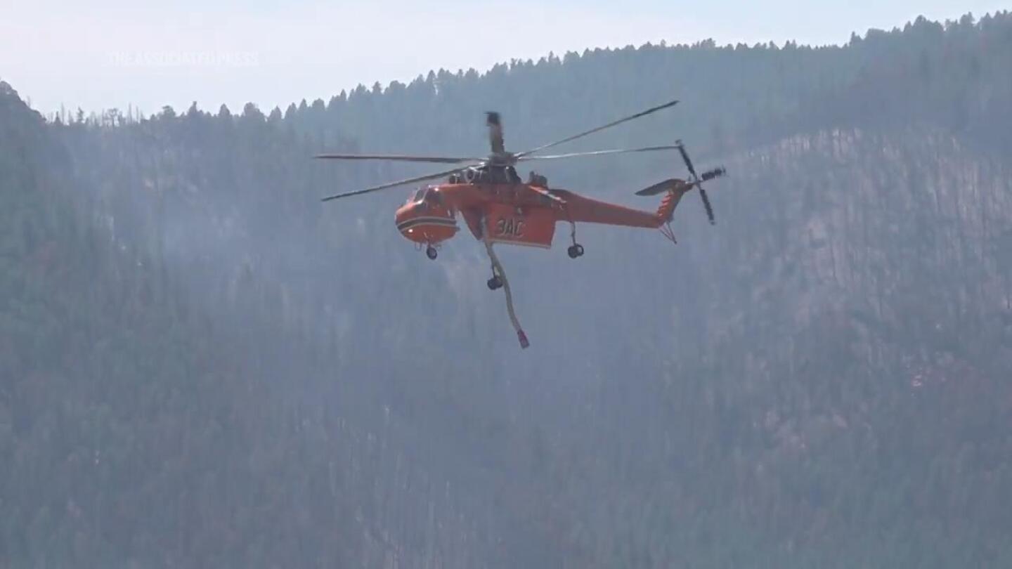 Wildfires encroach on Colorado neighborhoods