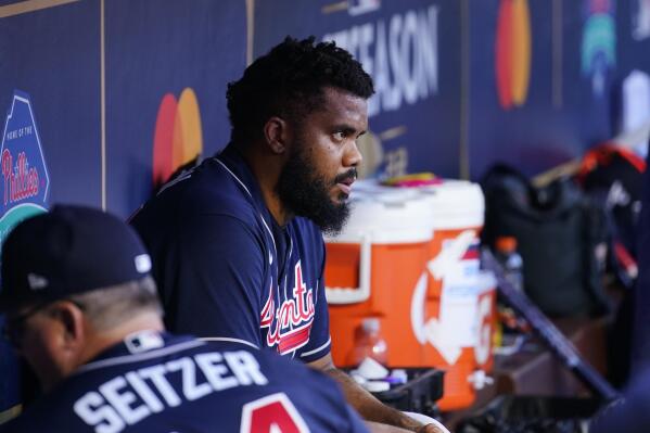 Atlanta Braves relief pitcher Kenley Jansen (74) watches play during the eighth inning in Game 4 of baseball's National League Division Series between the Philadelphia Phillies and the Atlanta Braves, Saturday, Oct. 15, 2022, in Philadelphia. (AP Photo/Matt Slocum)