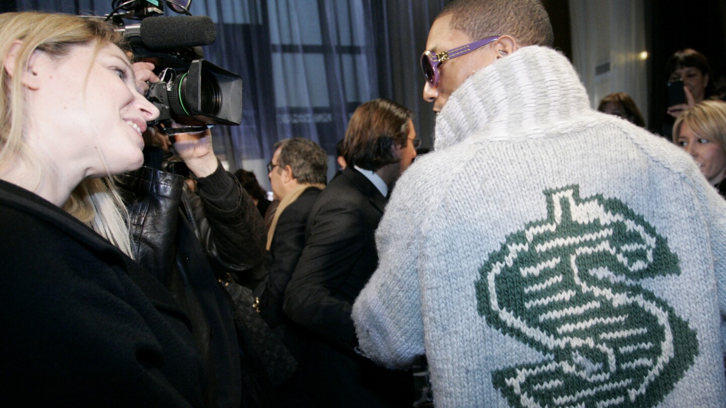 US singer Kanye West attends Louis Vuitton Men's Spring-Summer