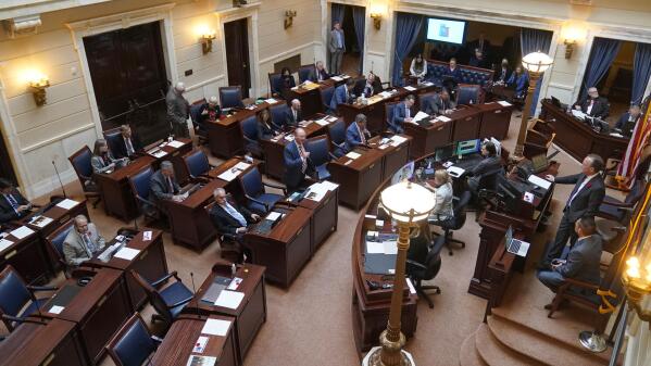 Utah Senate floor is shown Wednesday, Nov. 10, 2021, at the Utah State Capitol, in Salt Lake City. The Republican-controlled Utah Legislature approved new a congressional map Wednesday that further carves up Democratic-leaning Salt Lake County and largely ignores the work of an independent redistricting commission approved by voters. The new map now goes to GOP Gov. Spencer Cox, who indicated he will not veto it. (AP Photo/Rick Bowmer)