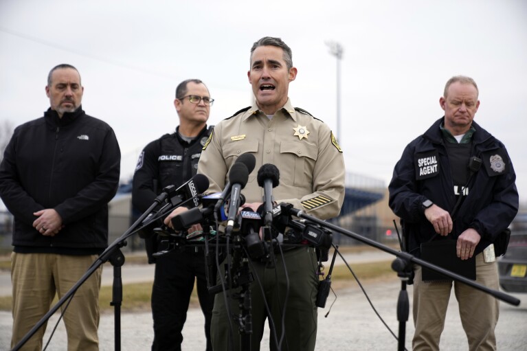 Dallas County (Iowa) Sheriff Adam Infante speaks outside Perry High School in Perry, Iowa, Thursday, Jan. 4, 2024, following a shooting at the city's high school.  (AP Photo/Andrew Harnik)
