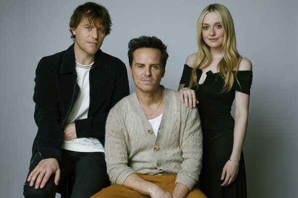 Johnny Flynn, from left, Andrew Scott, and Dakota Fanning pose for a portrait to promote the television miniseries "Ripley" on Tuesday, March 26, 2024, in New York. (Photo by Taylor Jewell/Invision/AP)