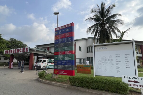 An ambulance is parked at the emergency unit of the National hospital in Abuja Nigeria, Wednesday, July. 26, 2023. The Nigerian Association of Resident Doctors on Wednesday is on strike again, demanding better working conditions for its members. (AP Photo/Chinedu Asadu)
