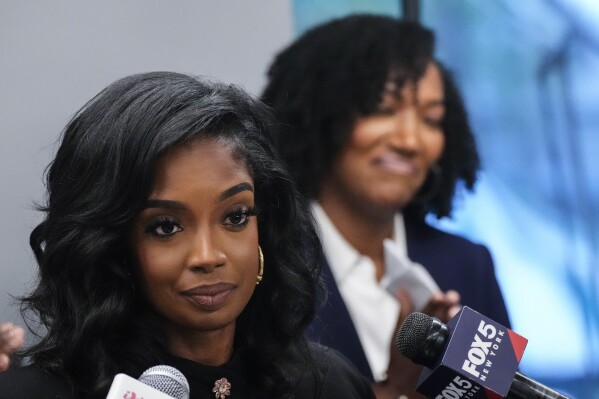Ayana Parsons, right, and Arian Simone, of Fearless Fund attend a during a news conference Thursday, Aug. 10, 2023, in New York. Attorneys for an Atlanta-based venture capital firm being sued over a grant program investing in Black women have vowed to fight back against the lawsuit calling it misguided and frivolous. (AP Photo/Frank Franklin II)