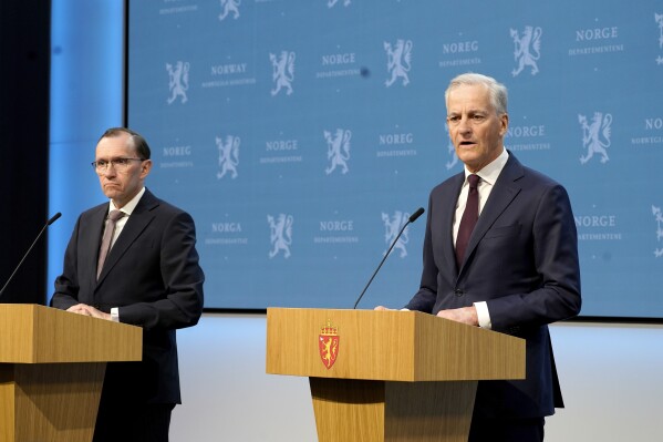 Norway's Prime Minister Jonas Gahr Store, right, with Foreign Minister Espen Barth Eide, speaks during a news conference in Oslo, Norway, Wednesday, May 22, 2024. Israel’s Foreign Minister Israel Katz has ordered Israel’s ambassadors from Ireland and Norway to immediately return to Israel, as Norway said it would recognize a Palestinian state and Ireland was expected to do the same. (Erik Flaaris Johansen/NTB Scanpix via AP)