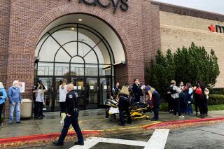 Police and emergency crews respond to a reported shooting at the Boise Towne Square shopping mall Monday, Oct. 25, 2021, in Boise, Idaho. (Darin Oswald/Idaho Statesman via AP)