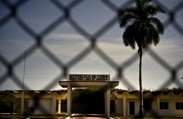 In this photo examined by American military officials, a building in Cuba carries the Spanish message 