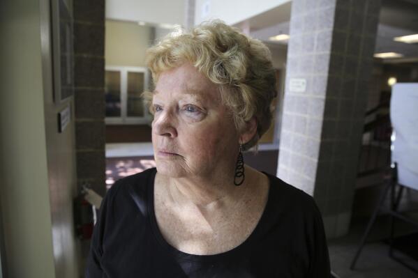 FILE - Clela Rorex, who was elected and served as Boulder County clerk and recorder in the 1970s, stands outside the offices of then-County Clerk Hillary Hall, in Boulder, Colo., on July 2, 2014. Rorex, a former Colorado county clerk considered a pioneering ally to the gay rights movement for being the first public official to issue a same-sex marriage license in 1975, has died at age 78. Rorex died Sunday, June 19, 2022, of complications from recent surgery at a hospice care facility in Longmont, the Daily Camera reported. (AP Photo/Brennan Linsley, File)