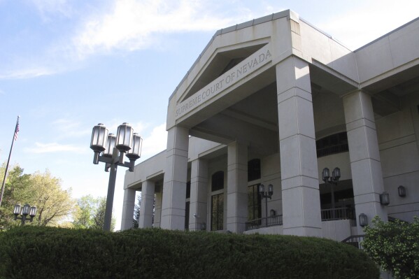 FILE - The Nevada Supreme Court building stands on May 2, 2018, in Carson City, Nev. Nevada's pardons board voted Wednesday, Sept. 20, 2023, to now consider requests for posthumous pardons in a limited scope, nearly six years after it voted to freeze such applications amid a backlog in cases. (AP Photo/Scott Sonner, File)