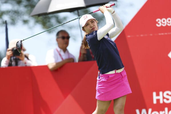 Ayaka Furue of Japan plays a shot on 10th tee during the first round of the HSBC Women's Wold Championship at the Sentosa Golf Club in Singapore Thursday, Feb. 29, 2024. (APPhoto/Danial Hakim)